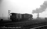 img1431 TM Neg Strip 45 33002 Returning to SR with Brake Van Cricklewood 22 Nov 61 copyright F...jpg